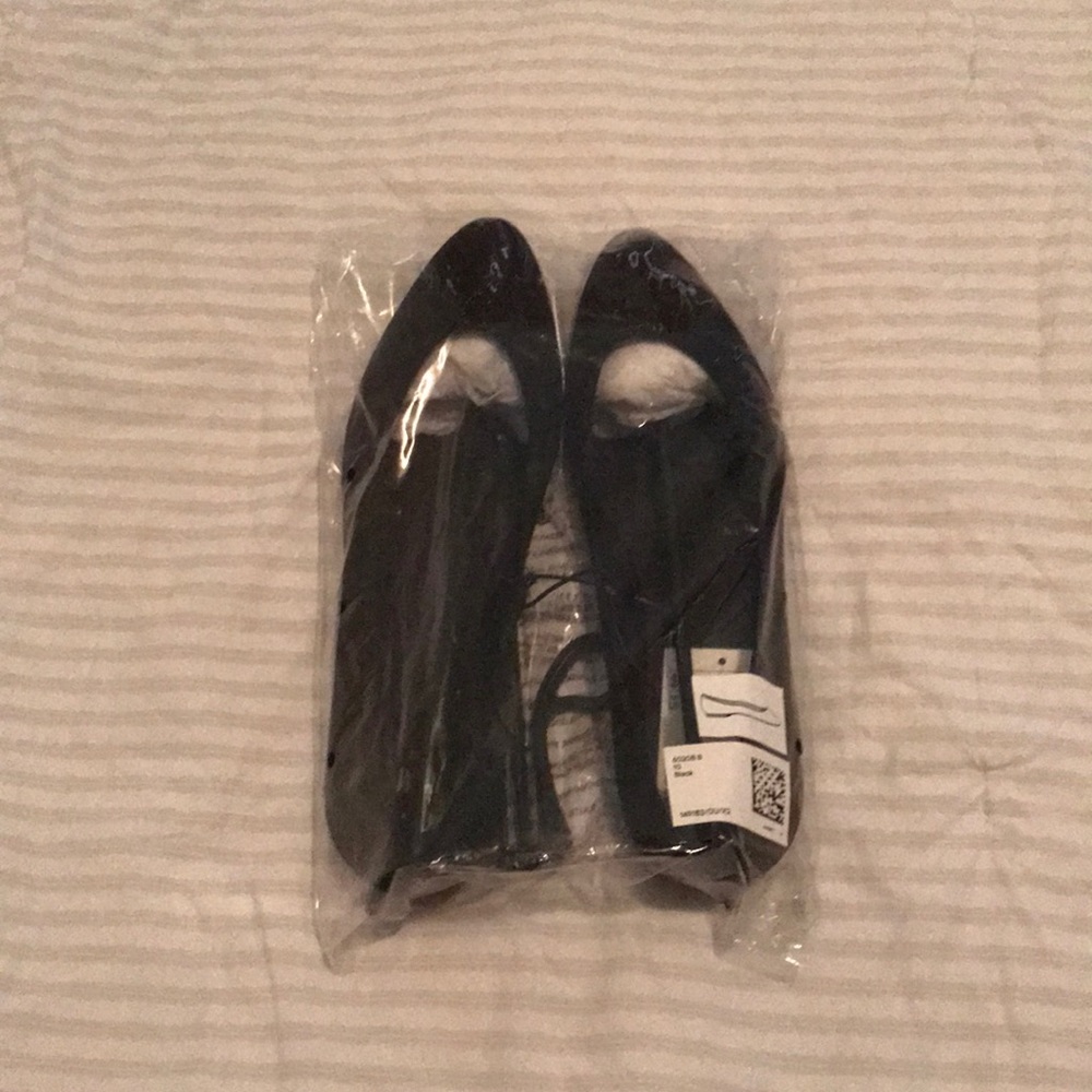 Fabric black flats.